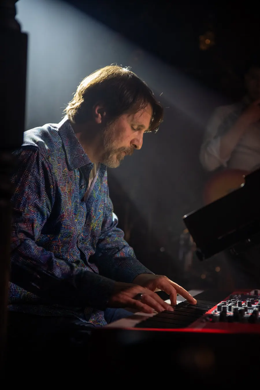 Frank Saia in profile at the keyboard